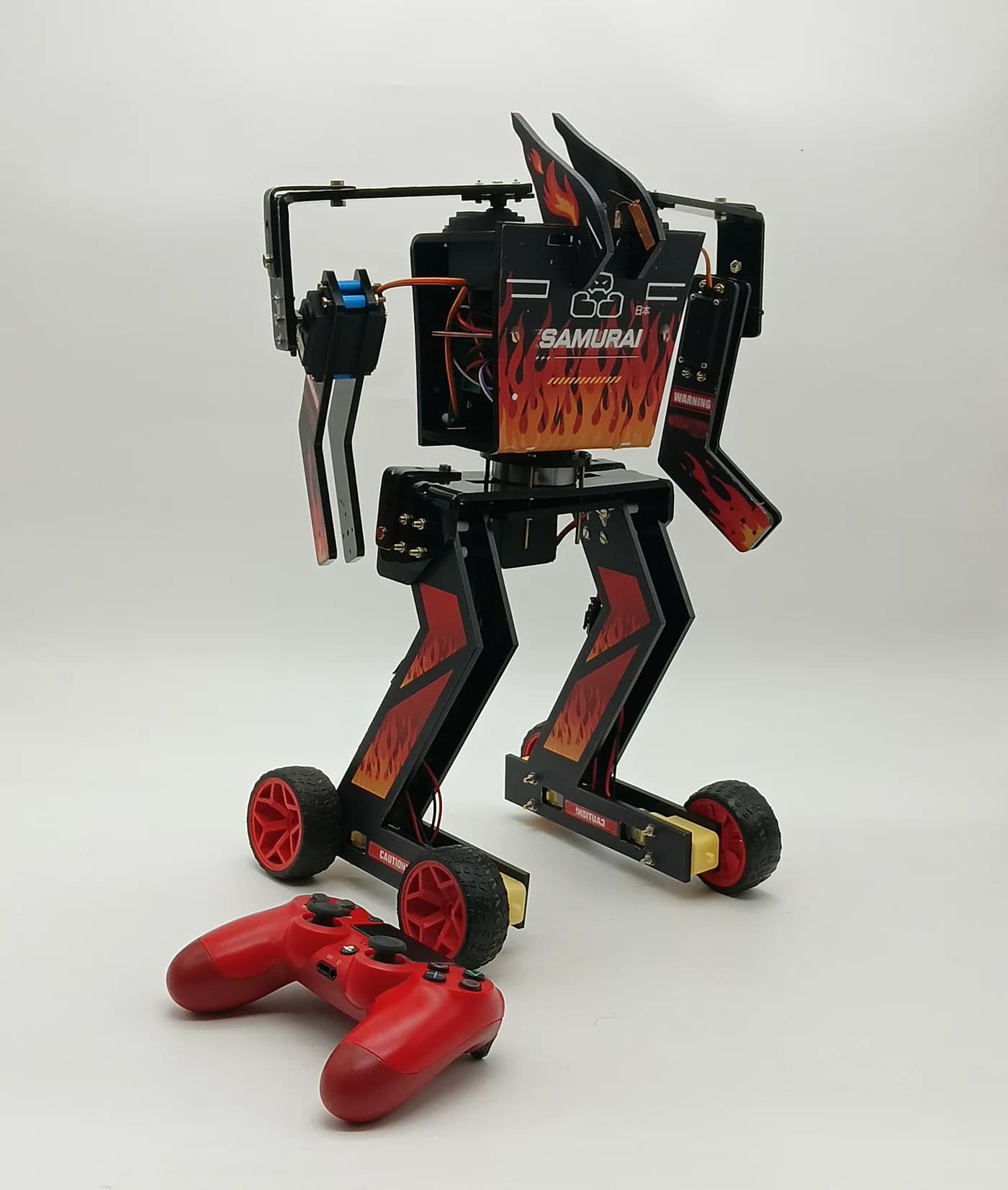 Pilots wiring a boxing robot ringside